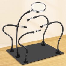 Multi functional strong magnetic fixture with magnifying glass